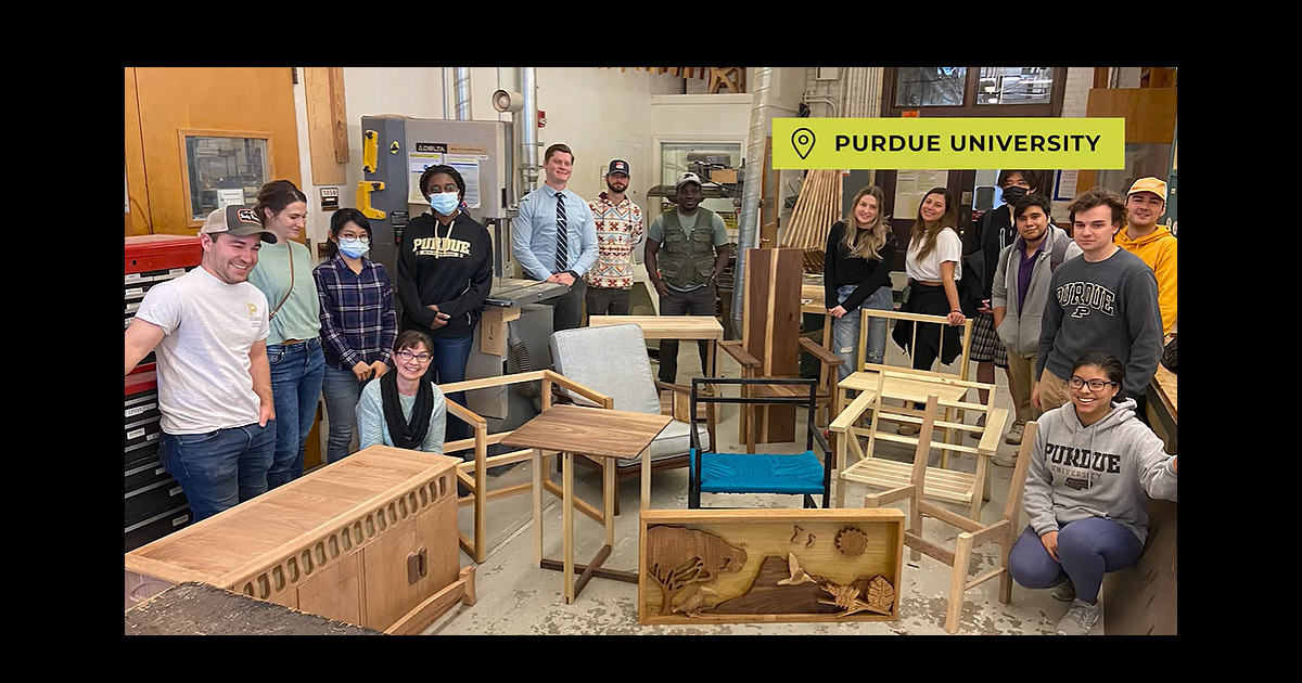 Wood Products Lab students posing with their various projects