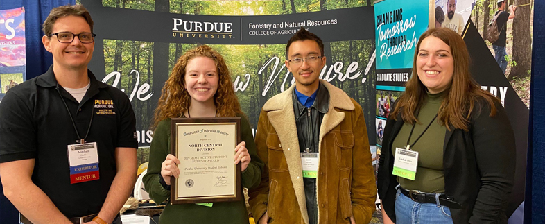 American Fiserhies Society student group receives most active group by AFS at Midsest Fish & Wildlife Conference.