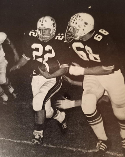 Dave Case playing football at Mishawaka High School in 1974