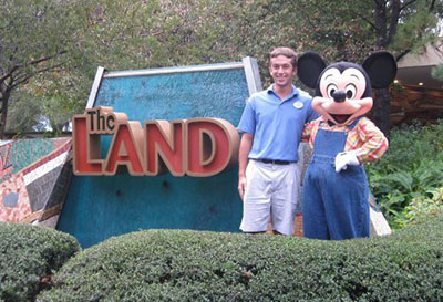 Austin Happel with Mickey Mouse at Epcot's The Land exhibit