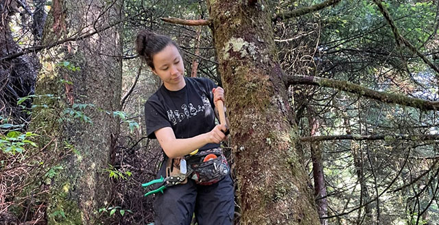 Master's student Tori Hongo backpacking in the Smoky Mountains