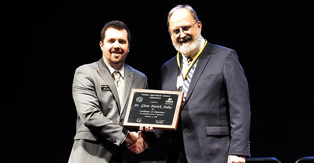 Dr. Glenn Juday receives his 2023 Certificate of Distinction award at the Ag Alumni Fish Fry. 