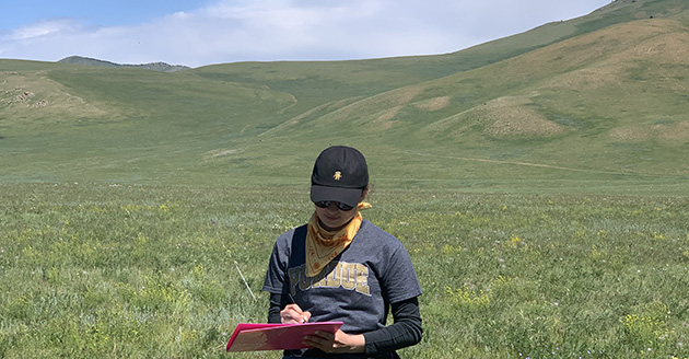 PhD student Sam Lima in the field in Mongolia
