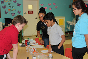 Elementary students engaged in an afterschool STEM lesson