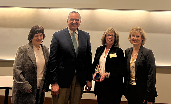 left to right: Dean Karen Plaut, Dr Neil Knobloch, Annetta Jones, and Dr Christina Wilson