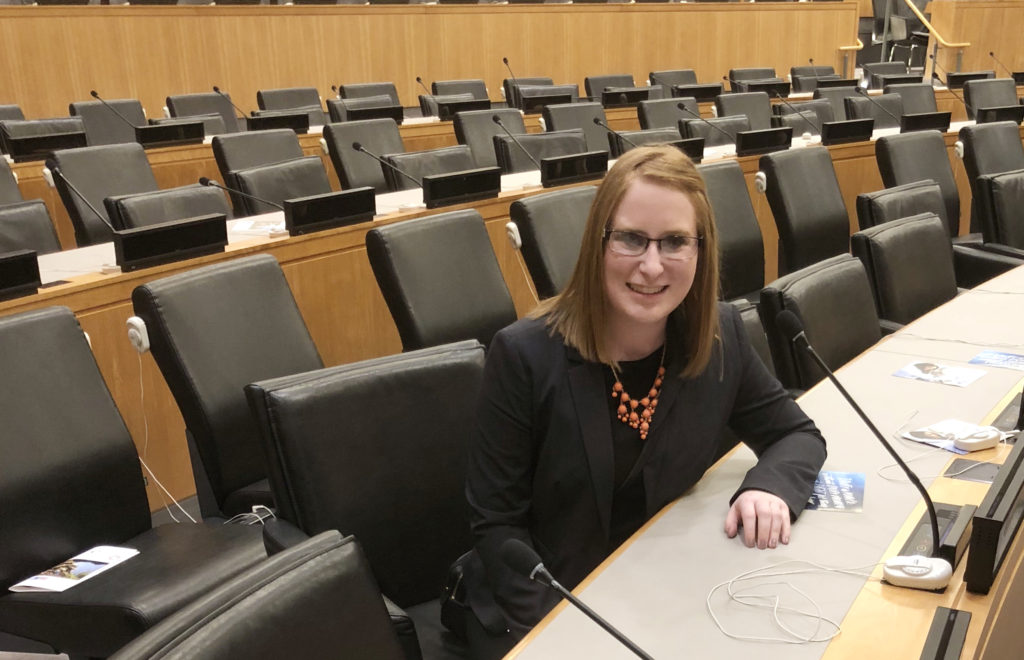 Student sitting in chair at the United Nations