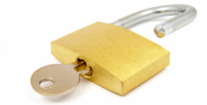 A gold padlock and key