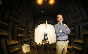 Paul standing among foam in the sound chamber