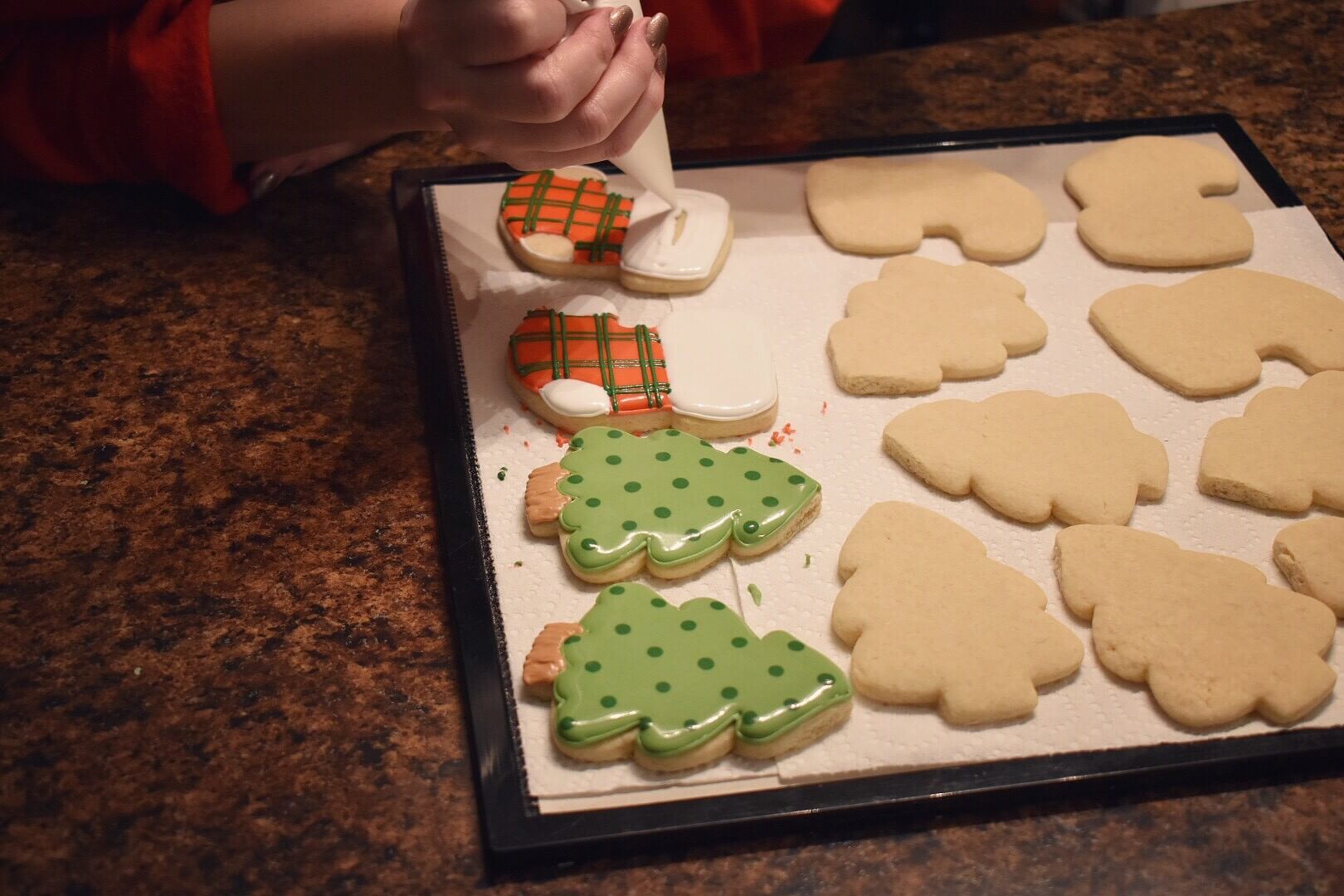 Decorating cookies on a tray