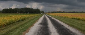 Road with stormy clouds