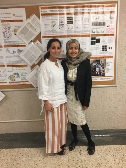 Lama AlAbdi (right) with Humaira Gowher at AlAbdi's thesis defense. 