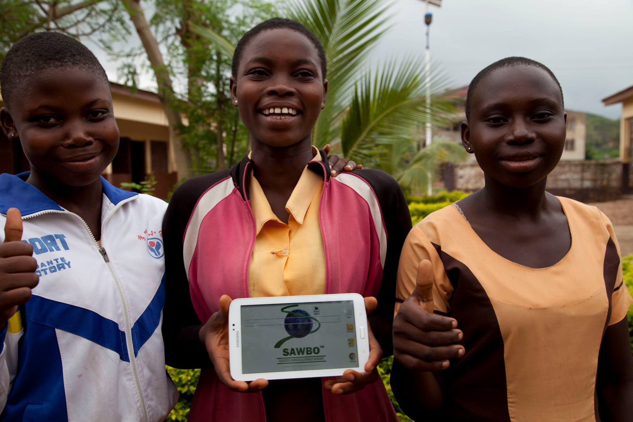 A few students in Ghana using the SAWBO phone app