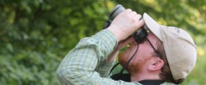 Man holding binoculars