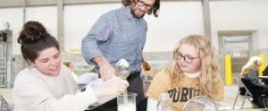 Paul Ebner with students making yogurt